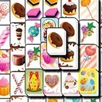 Griglia di dolci colorati e caramelle in uno stile di gioco di abbinamento